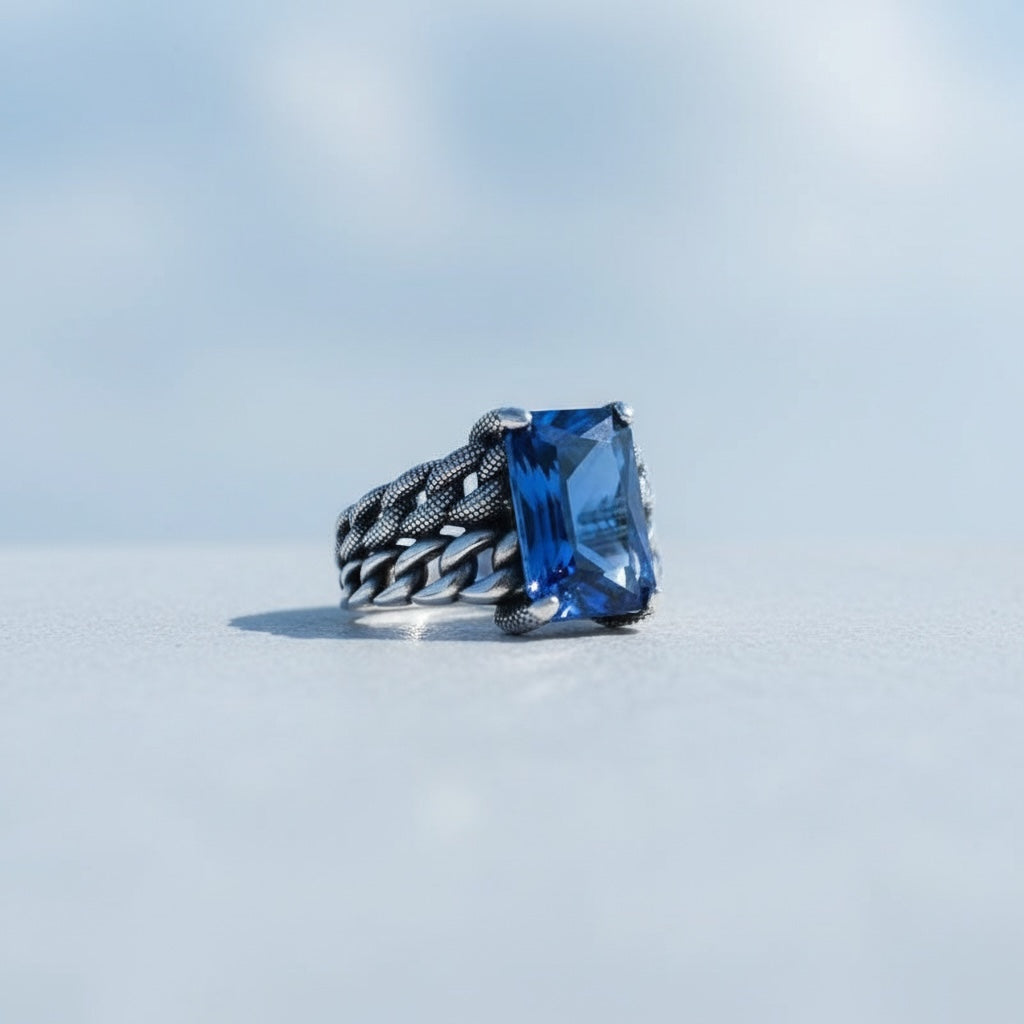 Silver men's ring with blue stone
