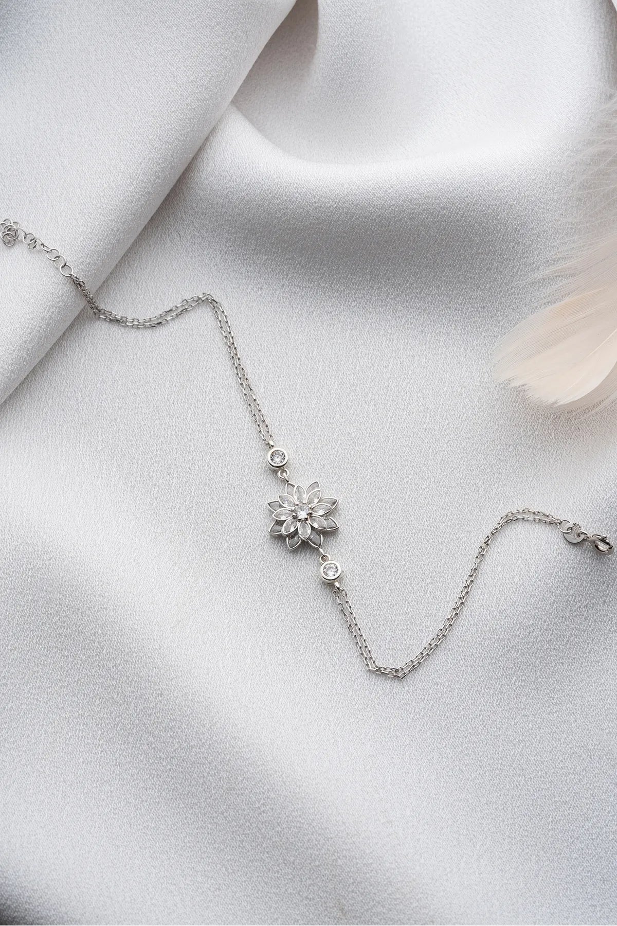 925 Sterling silver bracelet with white Zirconia and Lotus Design