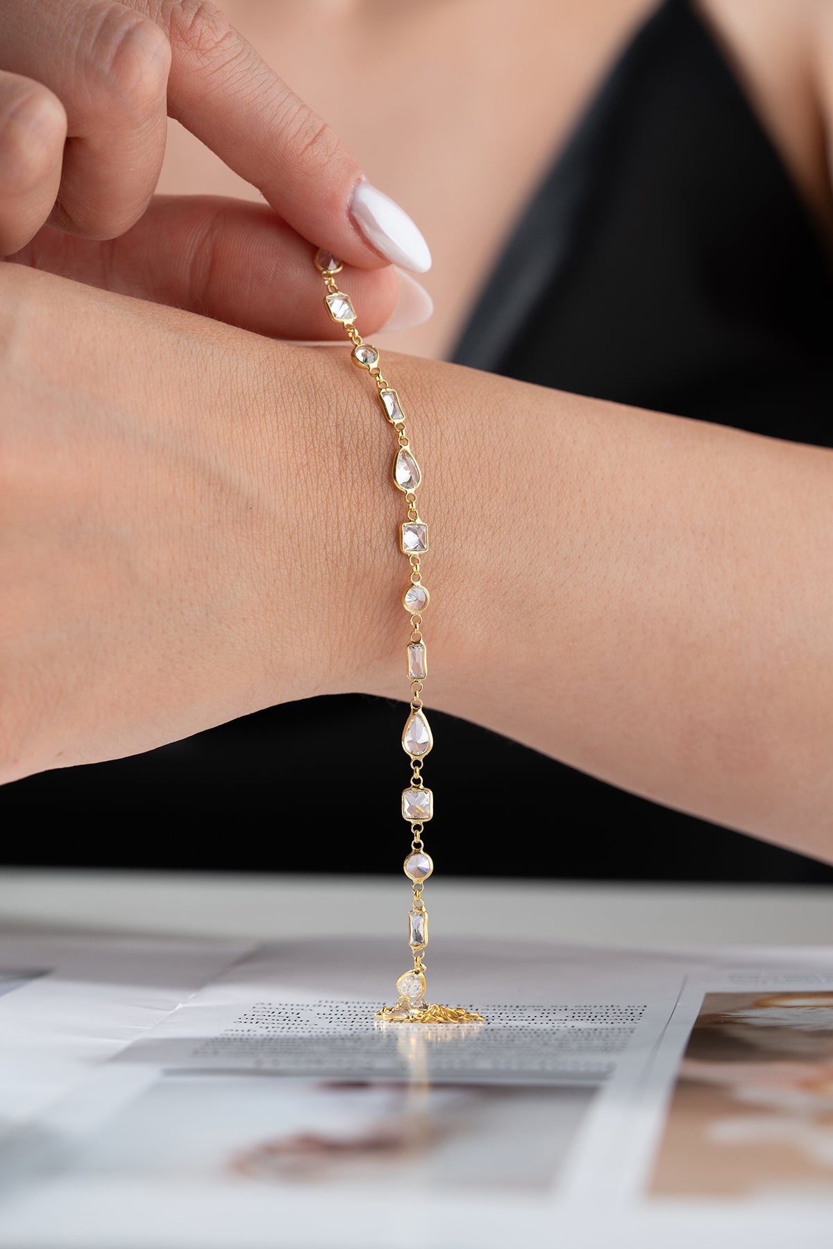 Gilt bracelet with geometric stones