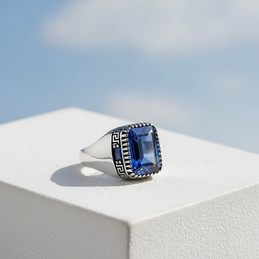 Silver men's ring with blue stone