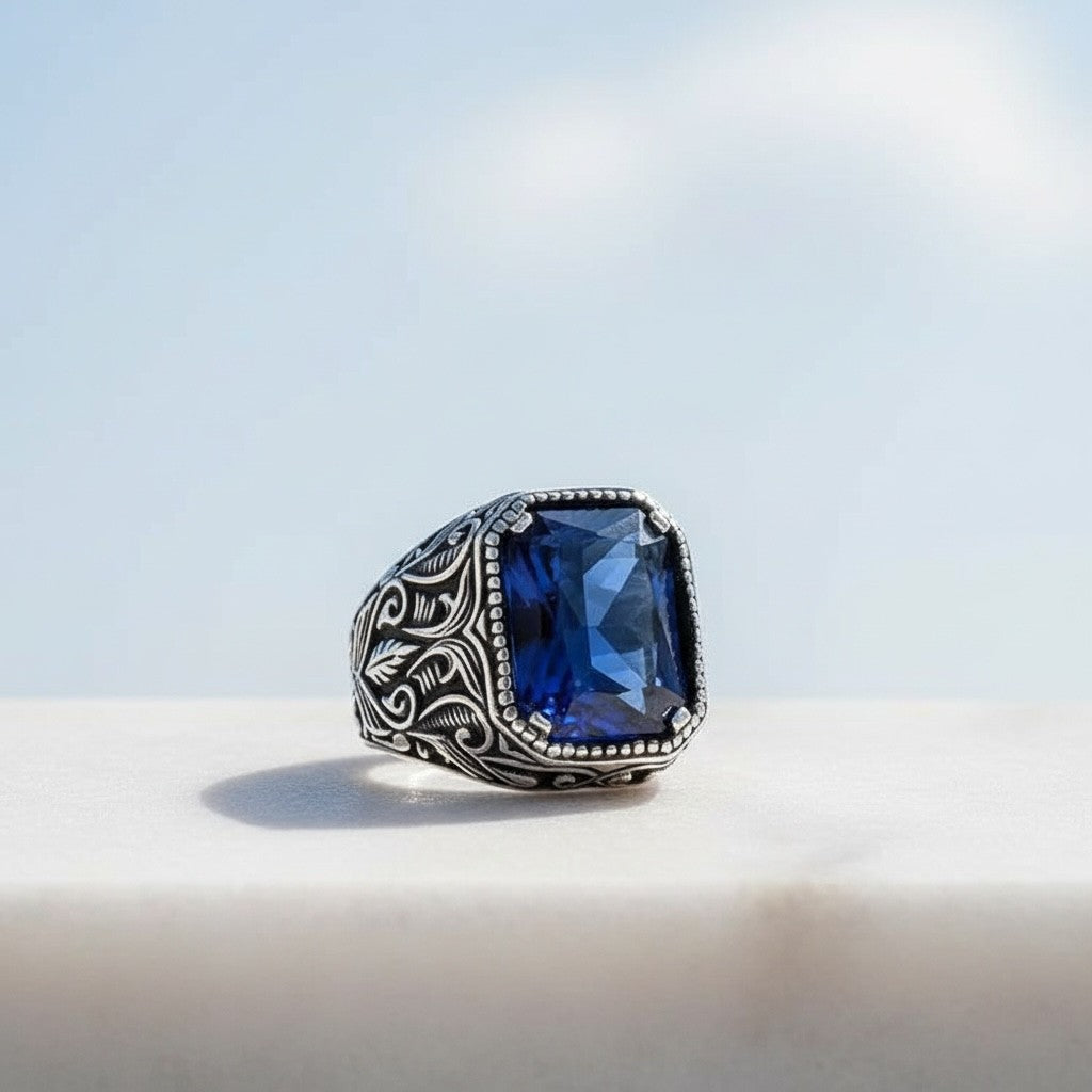 Silver men's ring with blue stone
