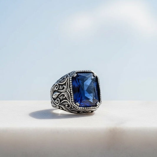 Silver men's ring with blue stone