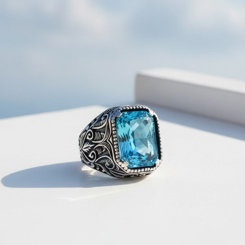 Silver men's ring with blue stone