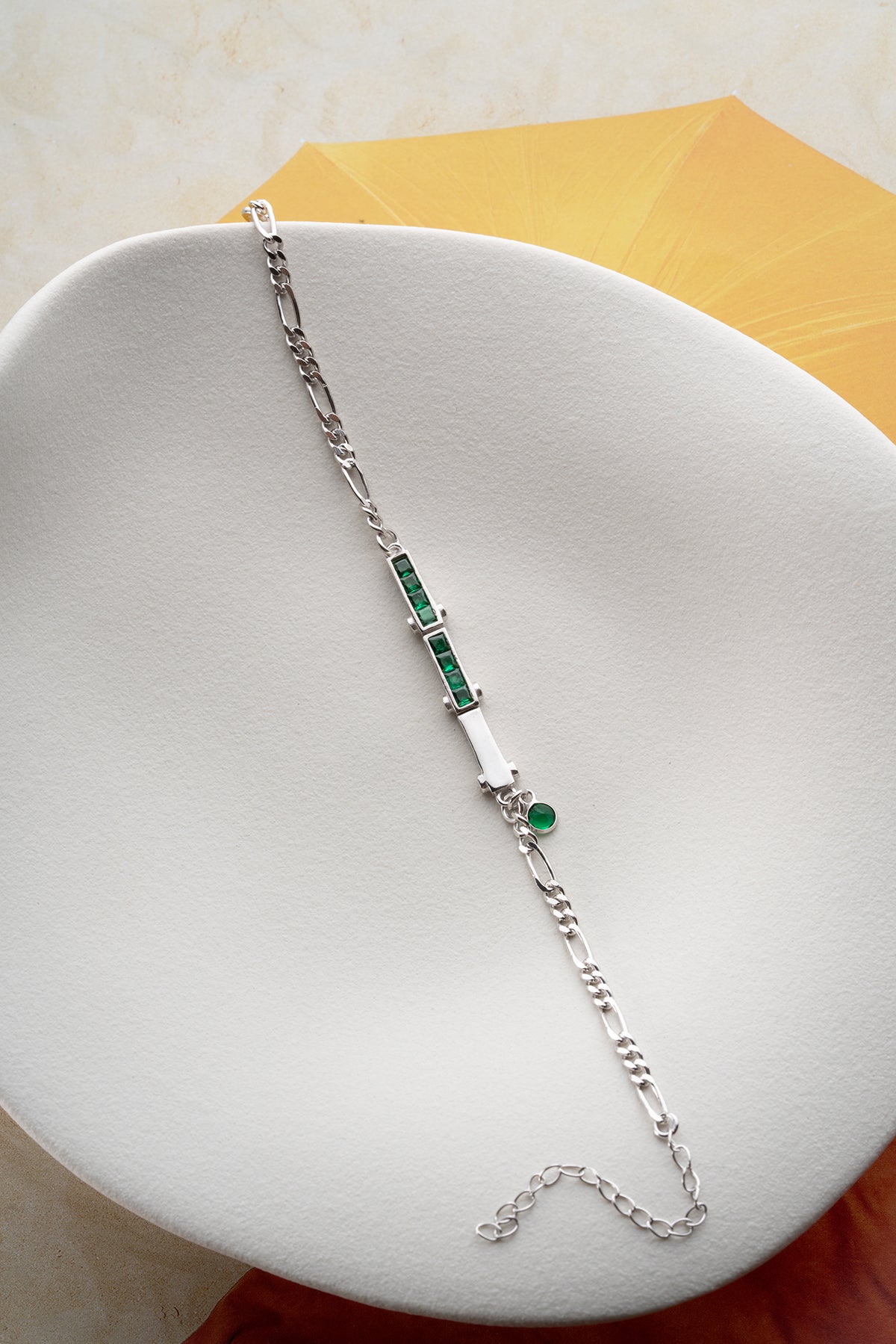 Silver Bracelet with Green Stones and Delicate Chain Design
