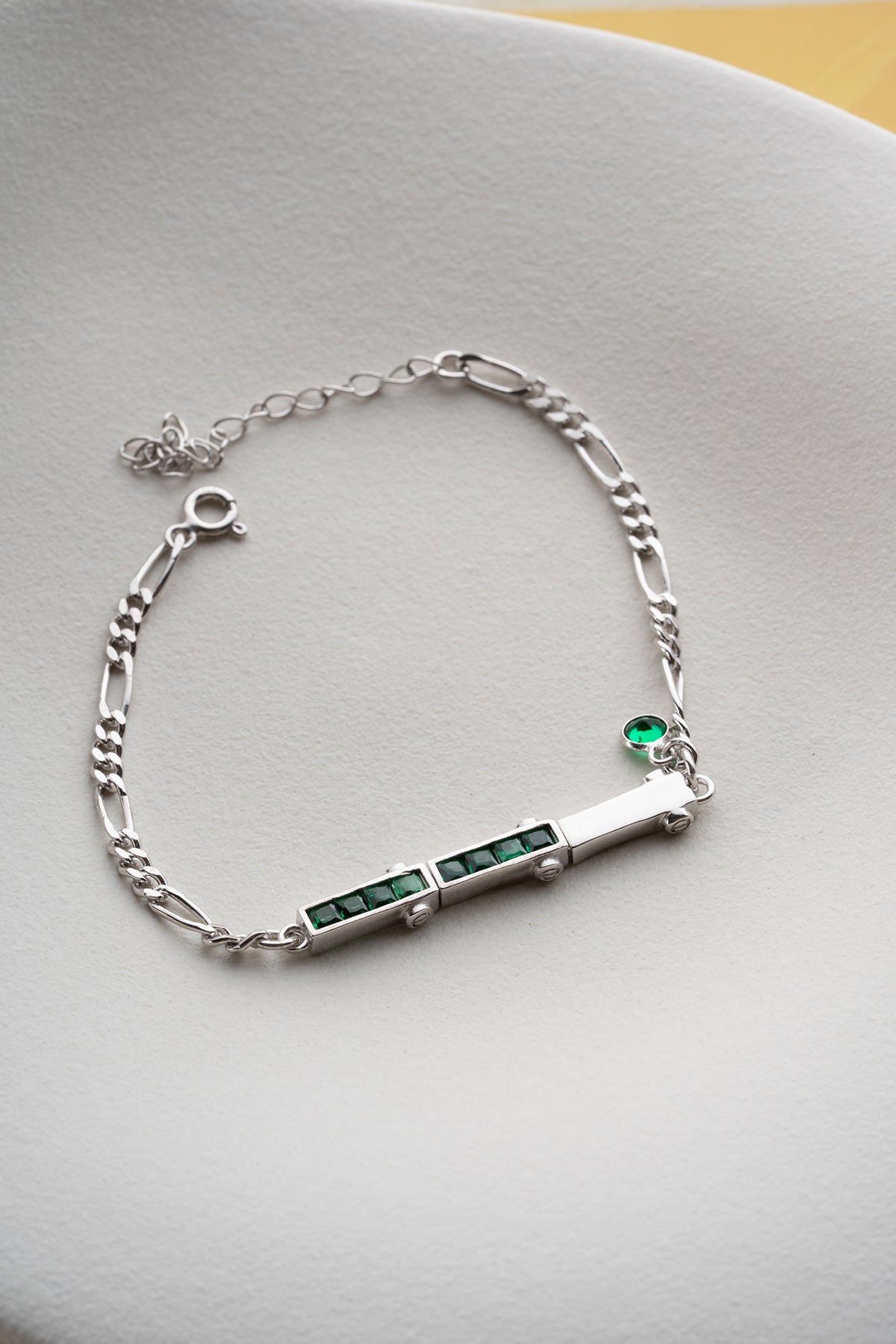 Silver Bracelet with Green Stones and Delicate Chain Design