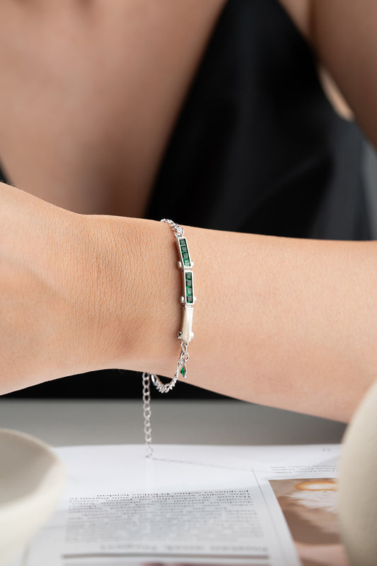 Silver Bracelet with Green Stones and Delicate Chain Design