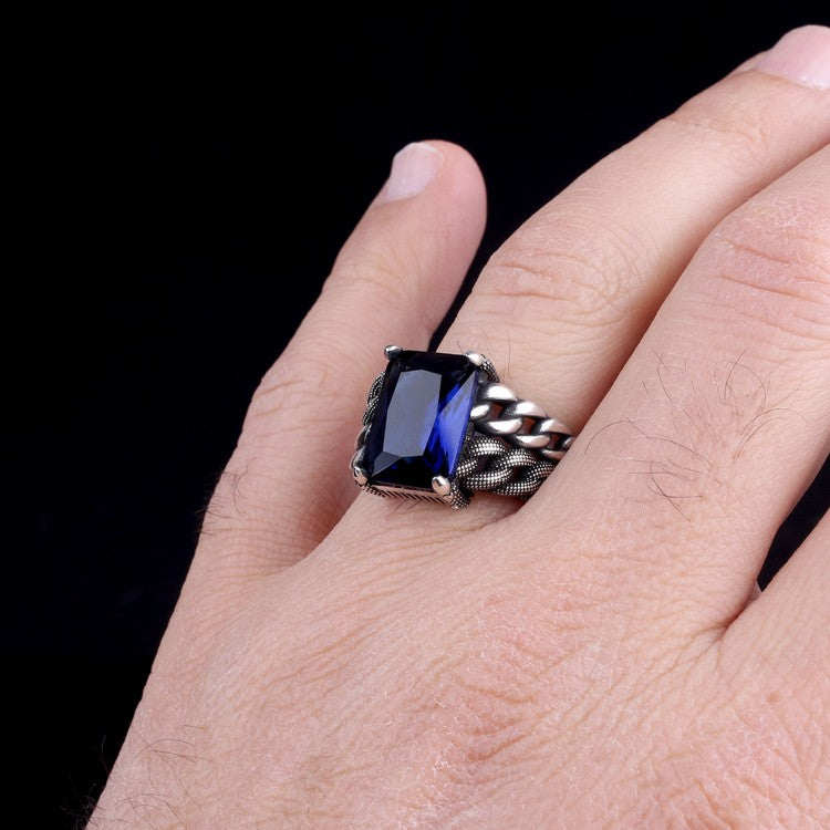 Silver men's ring with blue stone