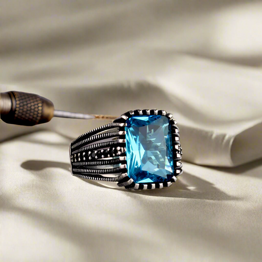 Silver men's ring with blue stone