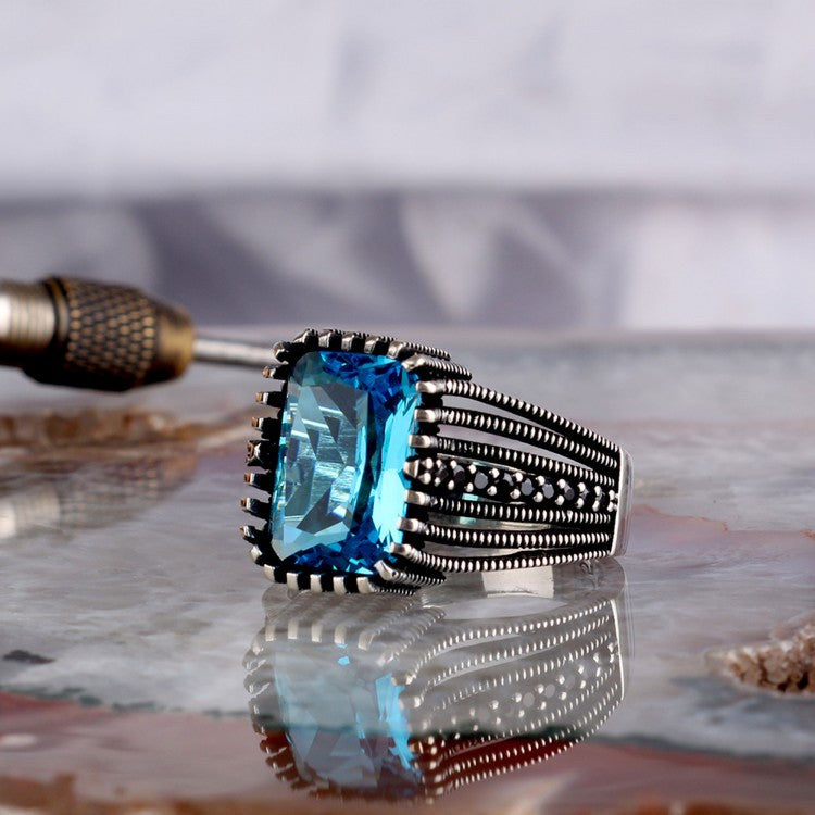 Silver men's ring with blue stone