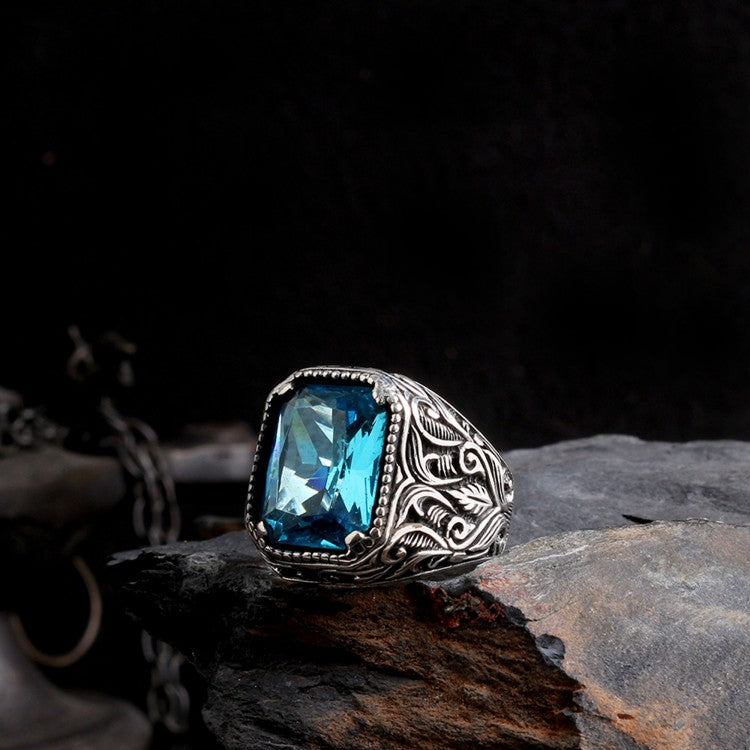 Silver men's ring with blue stone