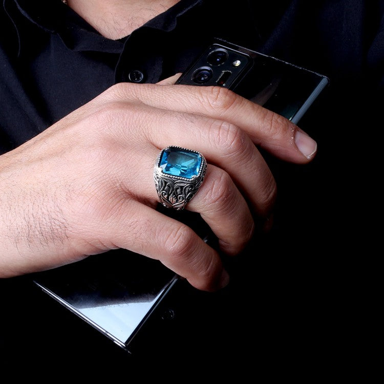 Silver men's ring with blue stone