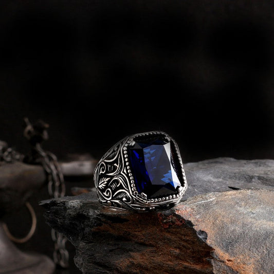 Silver men's ring with blue stone