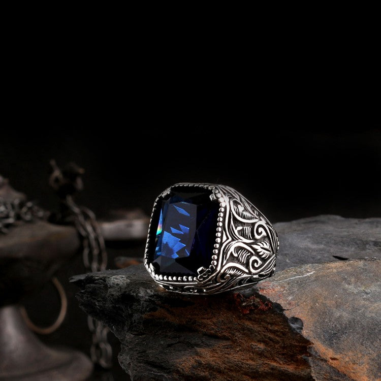 Silver men's ring with blue stone