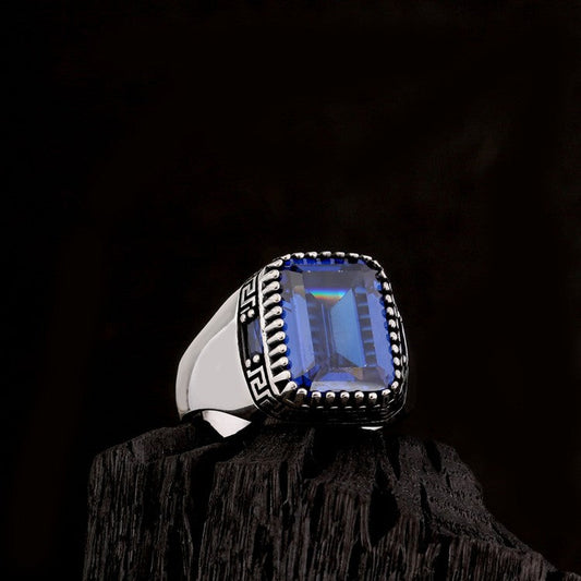 Silver men's ring with blue stone