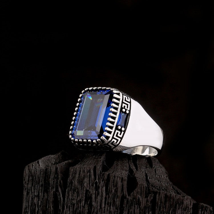 Silver men's ring with blue stone